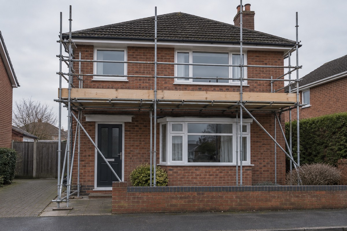 Scaffolding against the front of a house